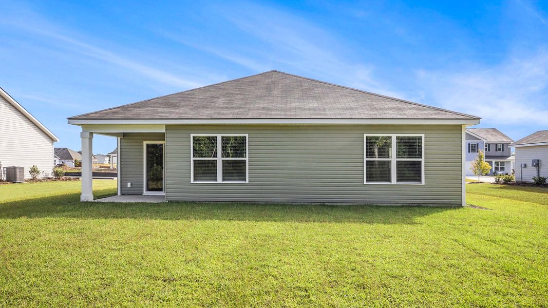 Exterior details and patio area of a home in Pinewood Estates, Conway (Image 4).