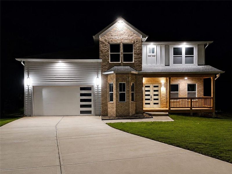 Front exterior of a new home in , Ellenwood, GA, highlighting curb appeal (Image 25).