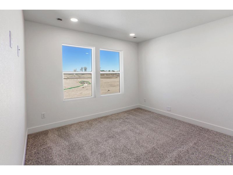Spacious, unfurnished interior of a new home in Prairie Song Story Collection - Single Family Homes, Windsor (Image 29).