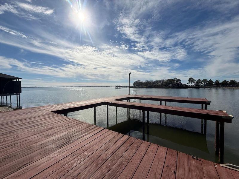 Dock area featuring a water view