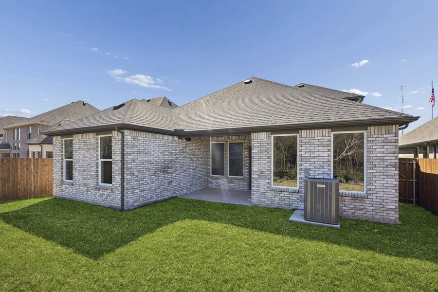 Exterior details and patio area of a home in Mercer Meadows, Royse City (Image 20).