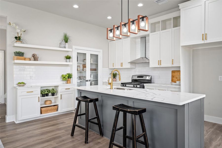 Bright Open Kitchen with ample countertop space and lots of storage,