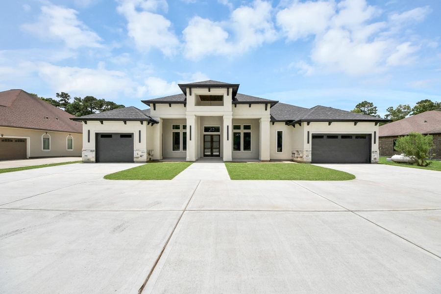 Front exterior of a new home in , Porter, TX, highlighting curb appeal (Image 24).