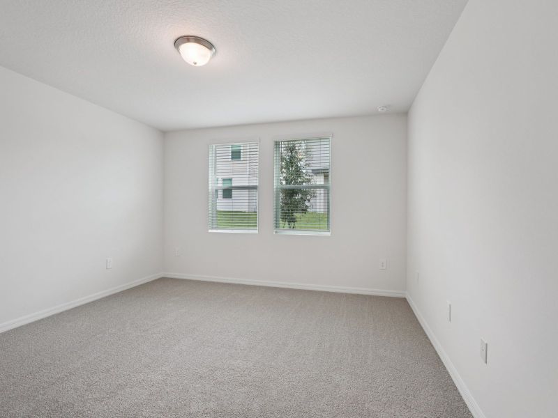 Spacious, unfurnished interior of a new home in Villamar - Classic Series, Winter Haven (Image 7).