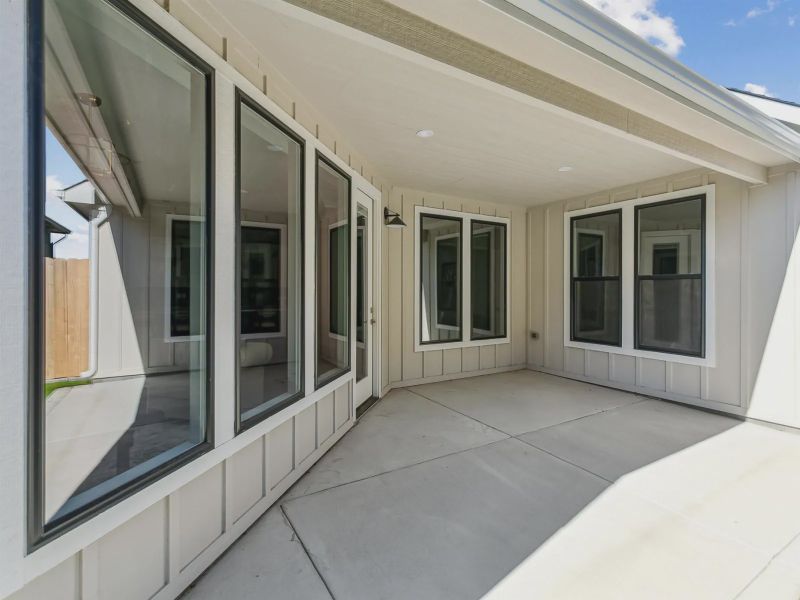 Exterior details and patio area of a home in The Courtyards at The Moorings, Wichita (Image 4). Exterior details and patio area of a home in The Courtyards at The Moorings, Wichita (Image 4).