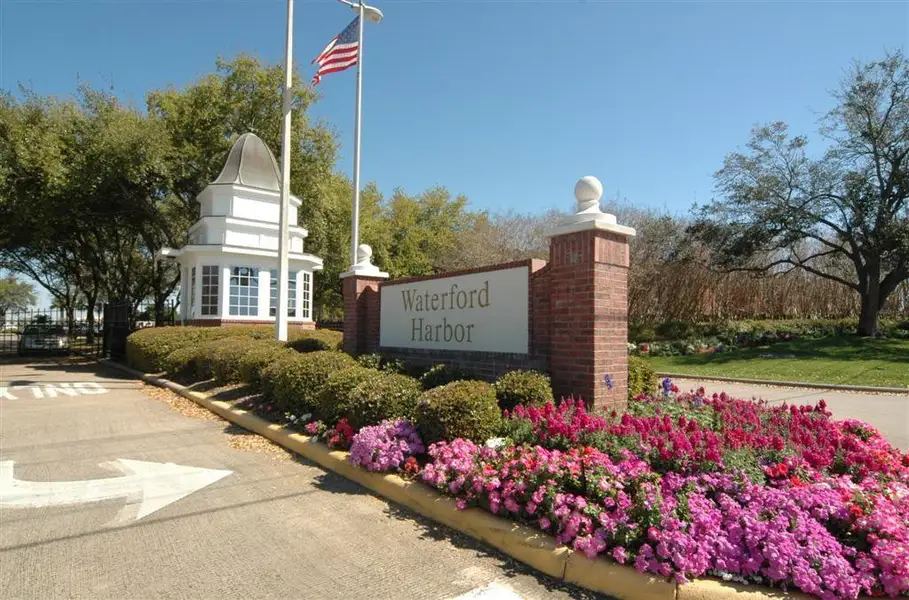 ENTRANCE TO WATERFORD HARBOR, AN EXCLUSIVE WATERFRONT COMMUNITY COMPLETE WITH 24 HOUR MANNED GATES AND DEEP-WATER MARINA.