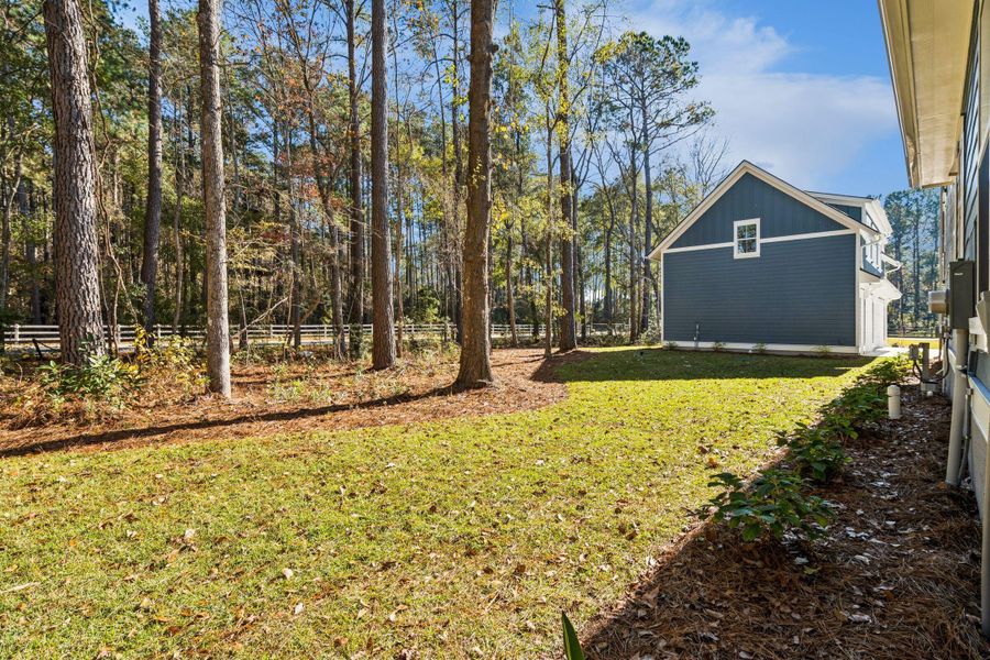 Exterior details and patio area of a home in , Awendaw (Image 44).