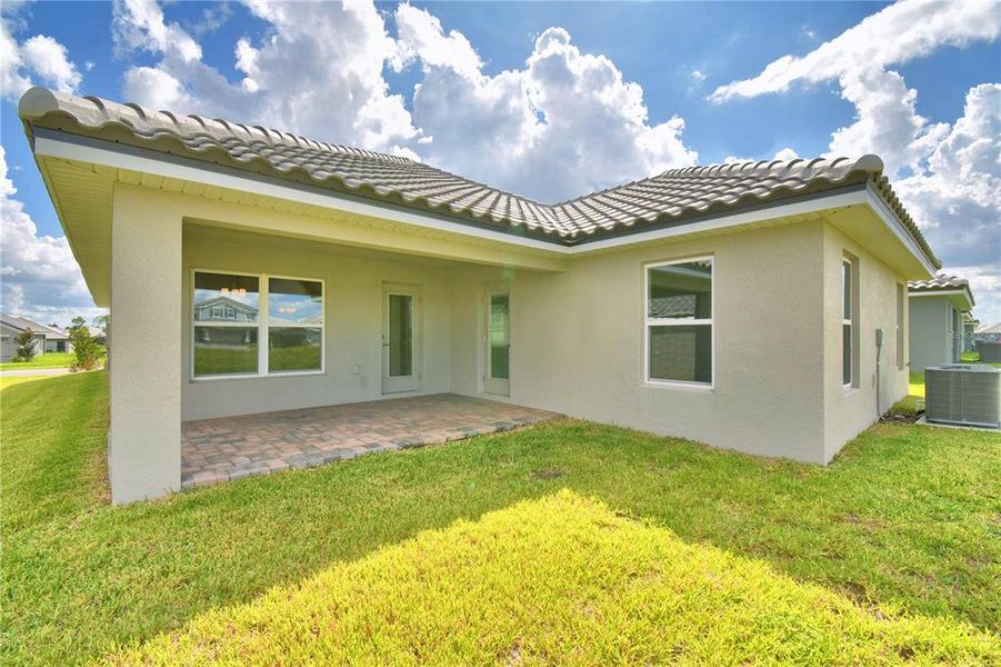 Exterior details and patio area of a home in , Auburndale (Image 30).