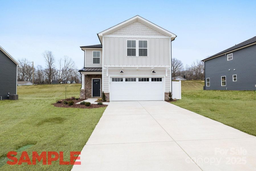 Front exterior of a new home in , Kannapolis, NC, highlighting curb appeal (Image 1). Front exterior of a new home in , Kannapolis, NC, highlighting curb appeal (Image 1).