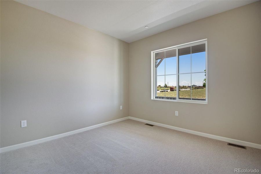Spacious, unfurnished interior of a new home in Reunion Ridge, Commerce City (Image 40).