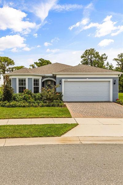 Front exterior of a new home in , Clermont, FL, highlighting curb appeal (Image 21). Front exterior of a new home in , Clermont, FL, highlighting curb appeal (Image 21).