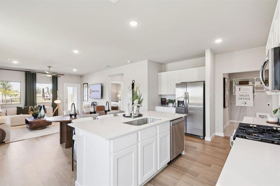 Kitchen in the Magnolia home plan by Trophy Signature Homes – REPRESENTATIVE PHOTO