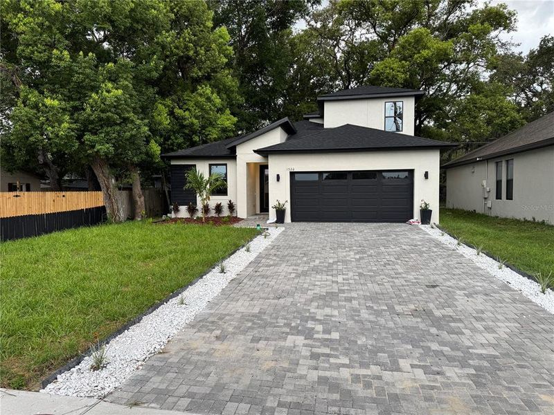Front exterior of a new home in , Gotha, FL, highlighting curb appeal (Image 23).