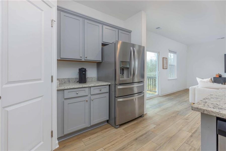 Furnished interior view inside a new home in Creekside at Farmers Crossing, Ball Ground (Image 12).