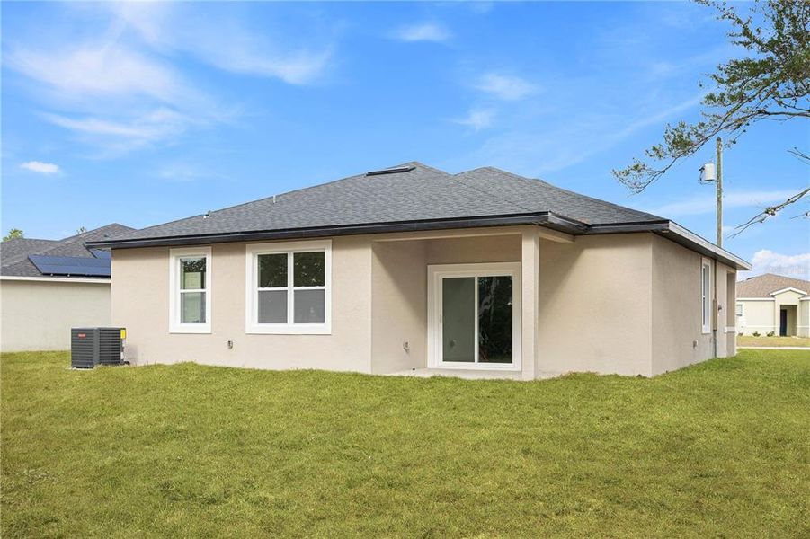 Exterior details and patio area of a home in , Poinciana (Image 19).