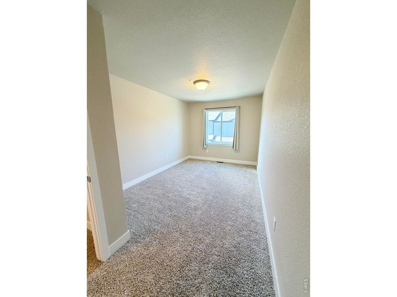 Spacious, unfurnished interior of a new home in Northridge Trails Townhomes, Greeley (Image 13).