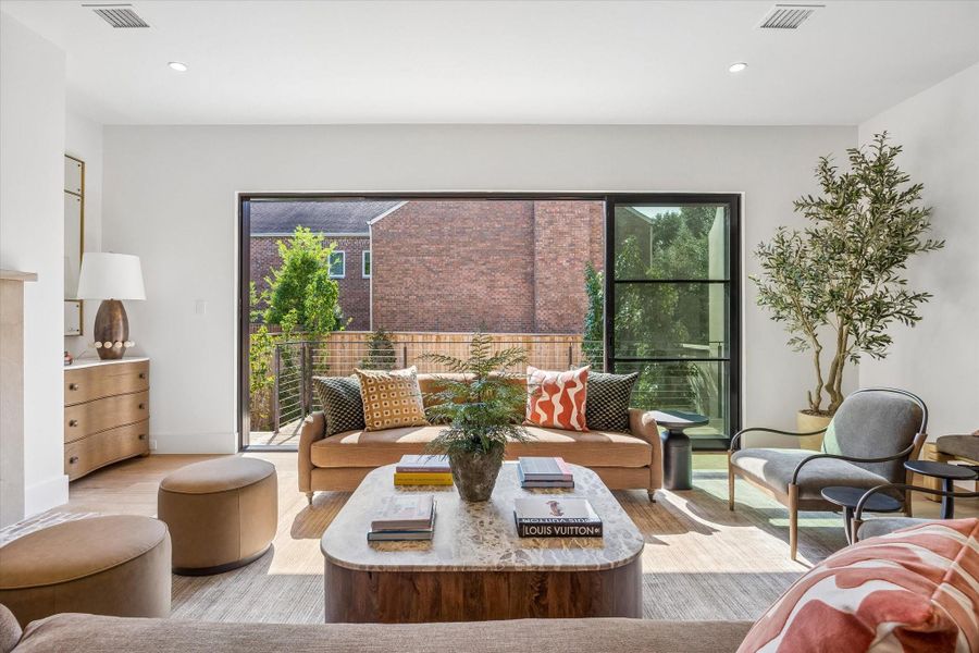 The Living Room with incredible retractable wall of windows for Houston’s best days and nights The Living Room with incredible retractable wall of windows for Houston’s best days and nights