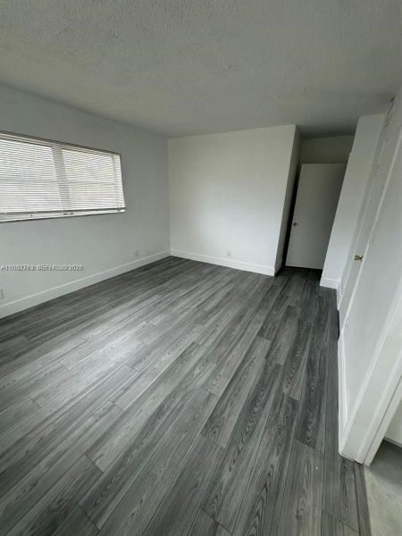 Spacious, unfurnished interior of a new home in , Hallandale Beach (Image 13).