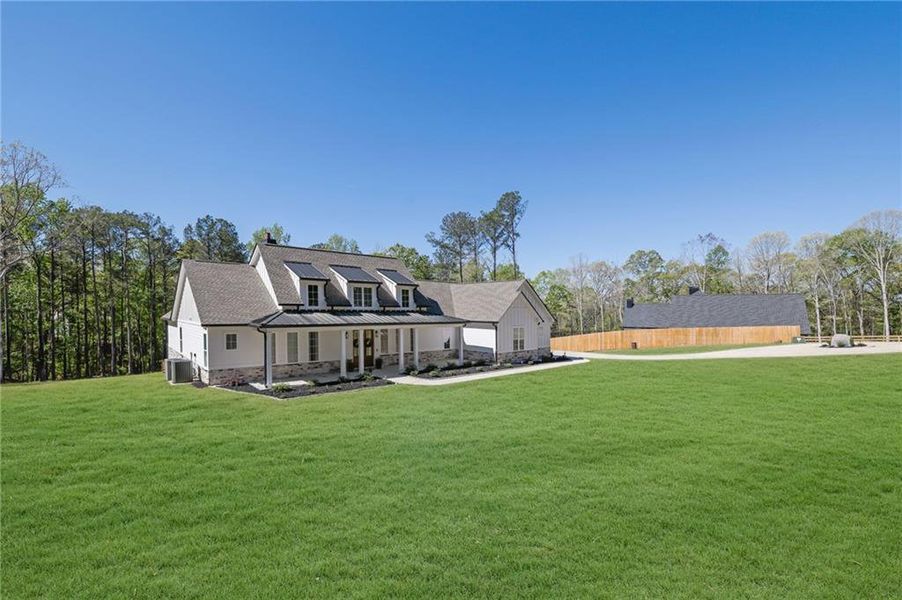 Exterior details and patio area of a home in , Monroe (Image 33).