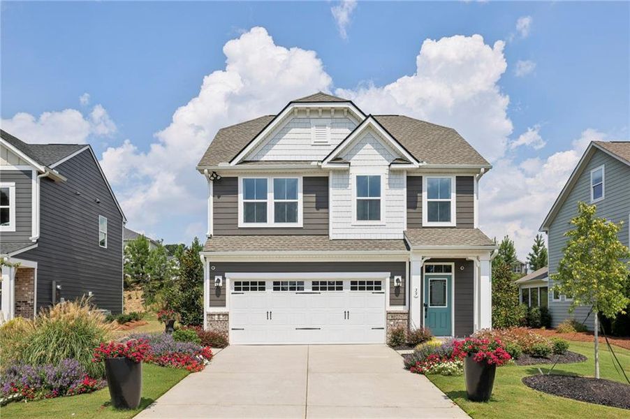Front exterior of a new home in , Hoschton, GA, highlighting curb appeal (Image 17).