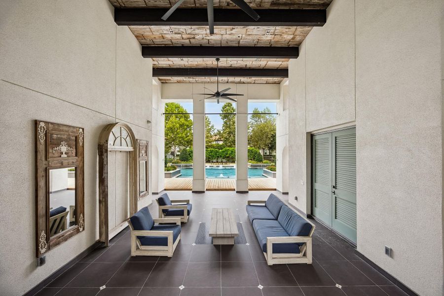 Ravenna clubhouse offers an inviting covered gathering area overlooking the pool.