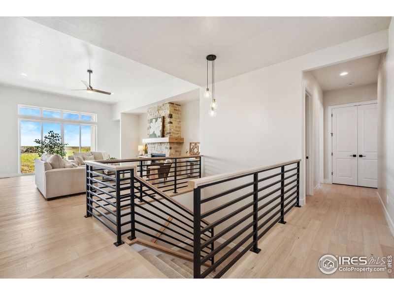 Modern Railing leading to full unfinished basement!