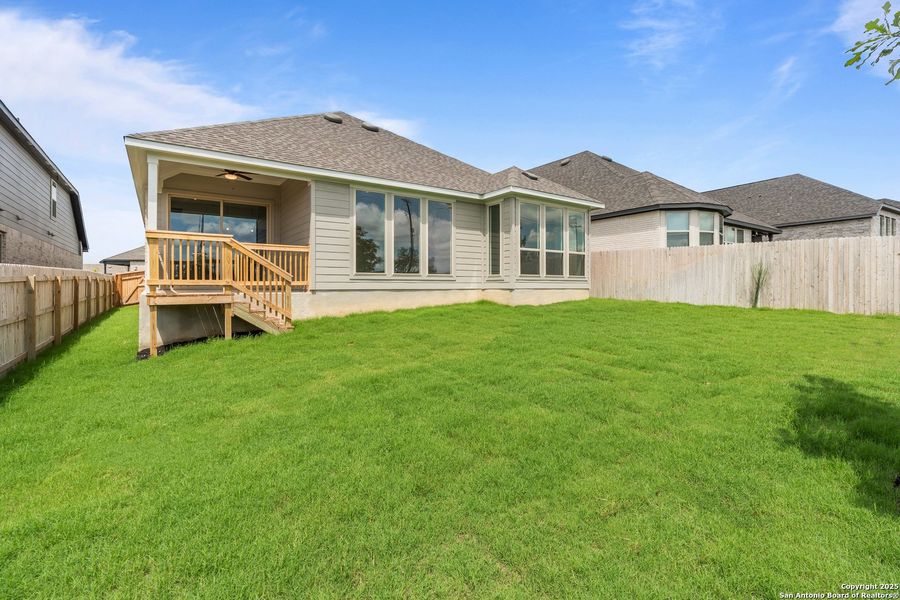Exterior details and patio area of a home in Bison Ridge, San Antonio (Image 18).