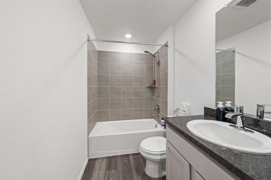 Furnished interior view inside a new home in The Canopies, Splendora (Image 11).