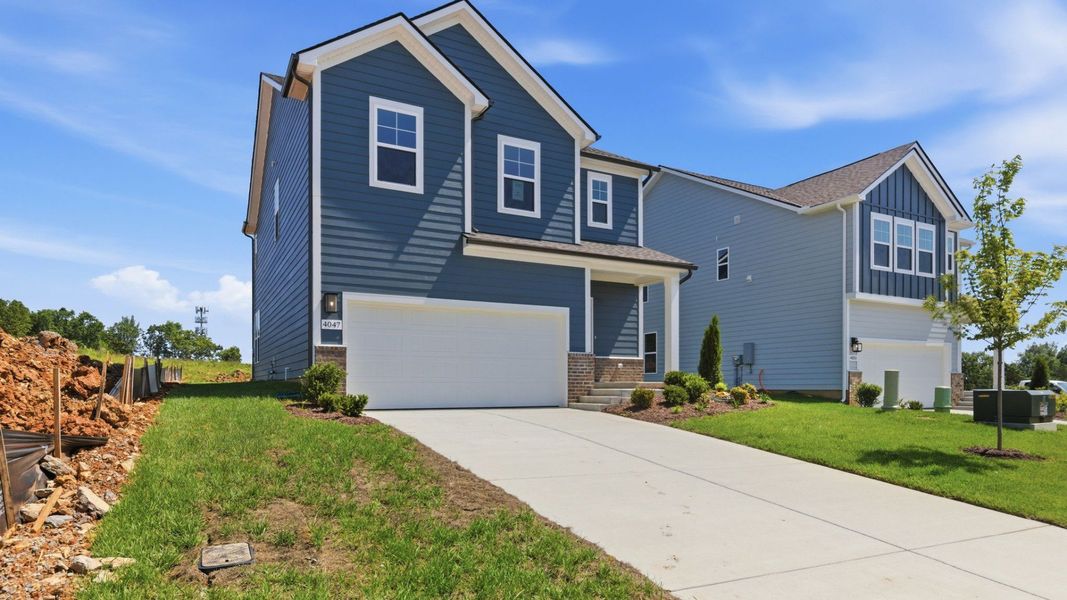 Exterior with 2-car garage
