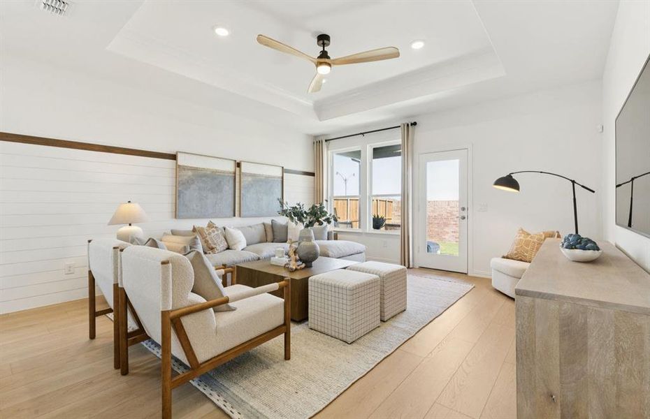 Gathering room with view of main living areas *Model Representation*