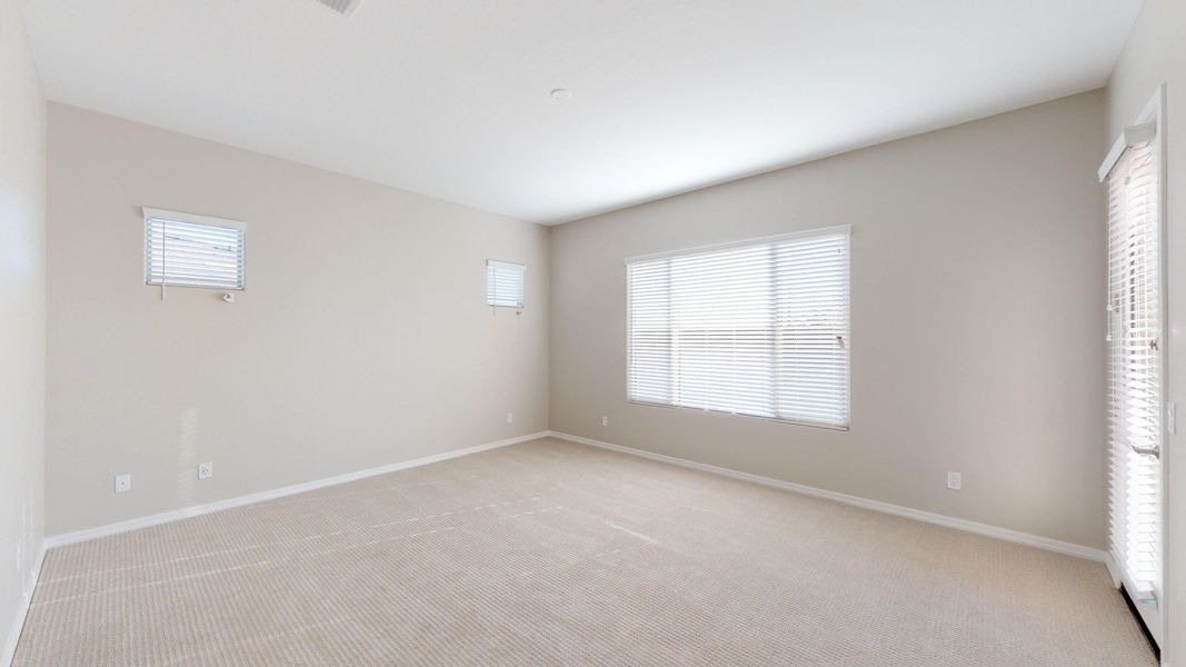 Representative furnished interior of a home built from the Benissa by DRB Homes in Windrose, Waddell (Image 12).