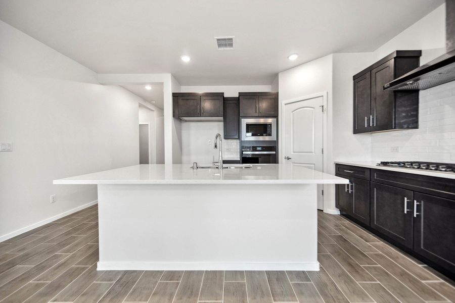 Representative furnished interior of a home built from the Valencia by Hakes Brothers in Summer Sky North, El Paso (Image 8).