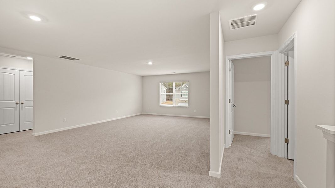 Representative unfurnished interior of a home built from the Mansfield by D.R. Horton in Northwoods at Mirror Lake, Villa Rica (Image 30).