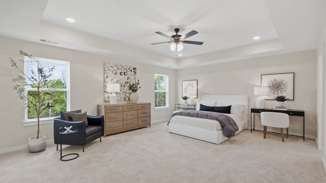 Windows to allow for natural light to enter the elevated primary bedroom