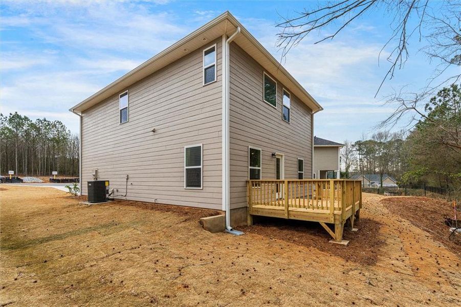 Exterior details and patio area of a home in Canterbury Villas, Carrollton (Image 22).