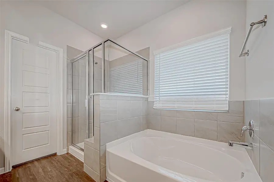 Furnished interior view inside a new home in Mill Creek Trails, Magnolia (Image 9).