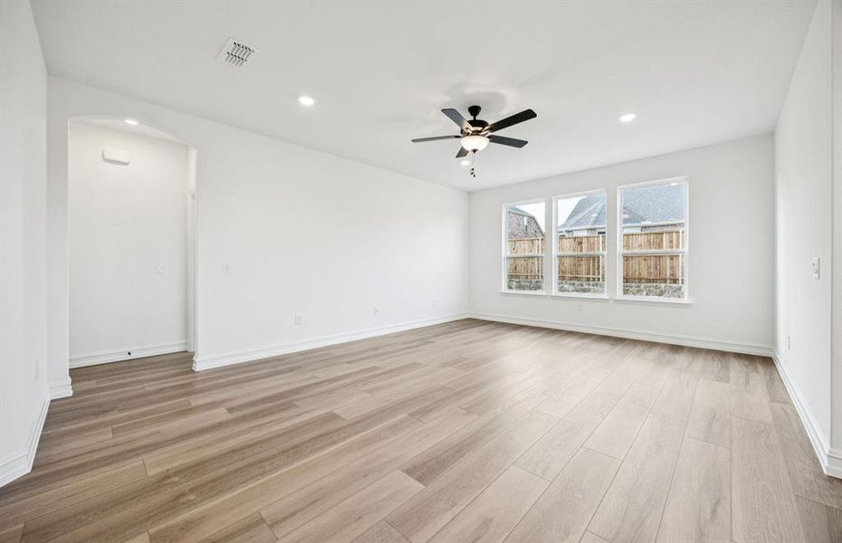 Sunlit gathering room designed for relaxation and entertainment Sunlit gathering room designed for relaxation and entertainment