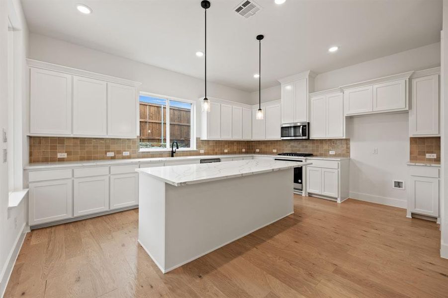 Furnished interior view inside a new home in North Square at Uptown, Celina (Image 7).