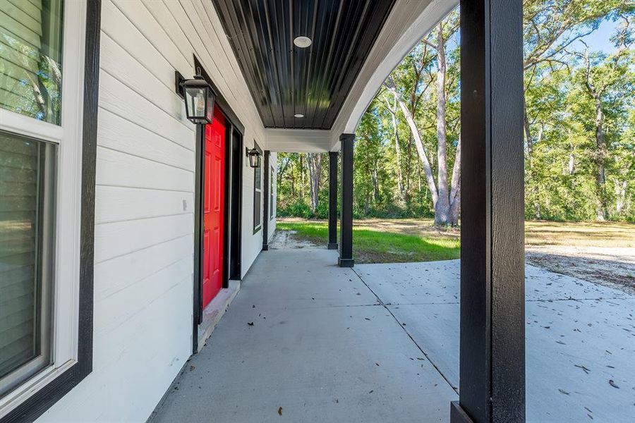Exterior details and patio area of a home in , Bell (Image 25).