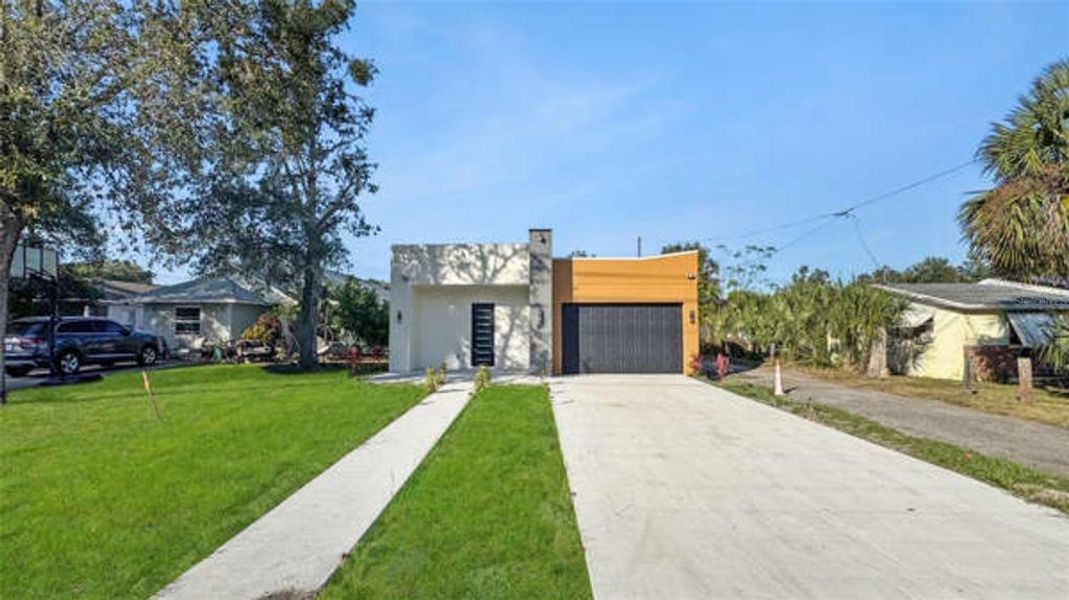 Front exterior of a new home in , Apopka, FL, highlighting curb appeal (Image 26).