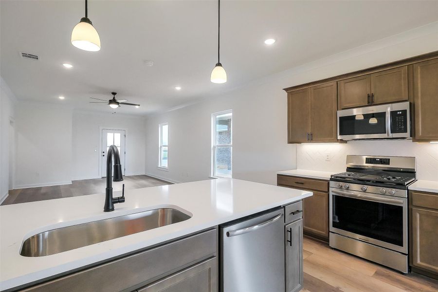 Furnished interior view inside a new home in Aldeana, Bonney (Image 12).