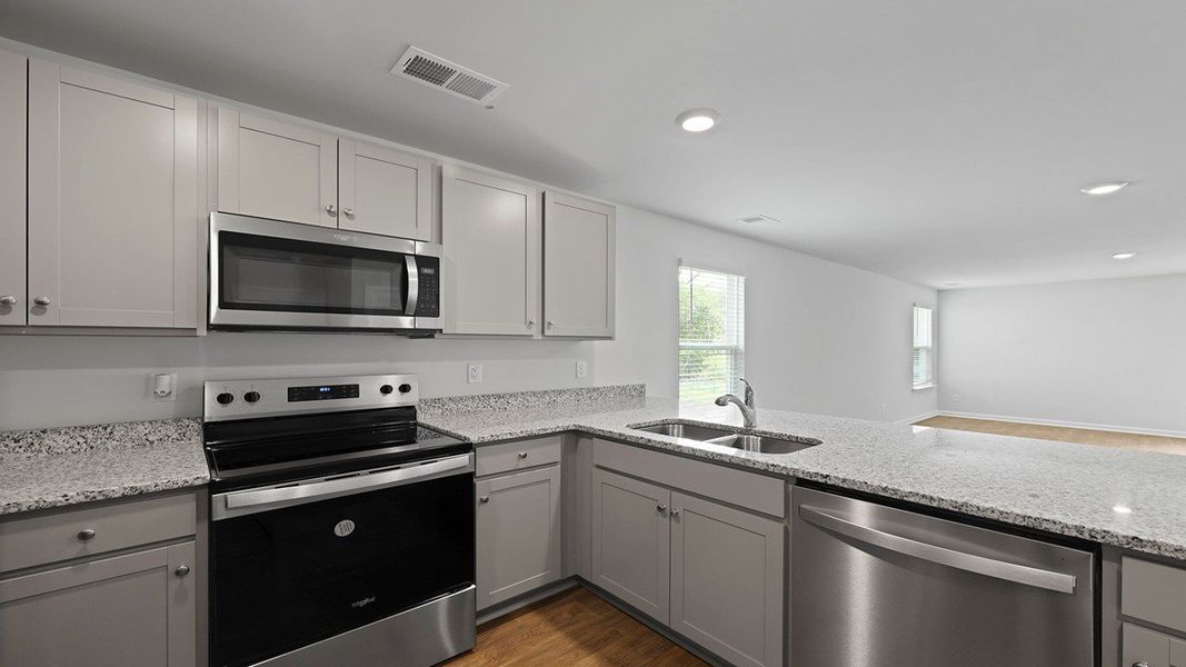 Furnished interior view inside a new home in Center Pointe, Santee (Image 4).