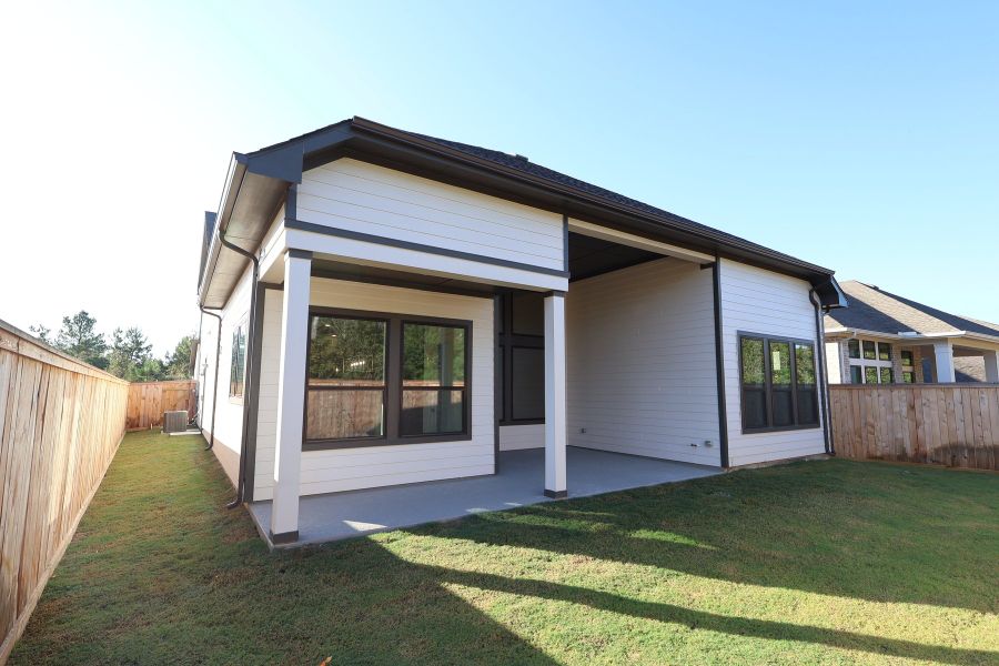 Exterior details and patio area of a home in Kresston, Magnolia (Image 3).