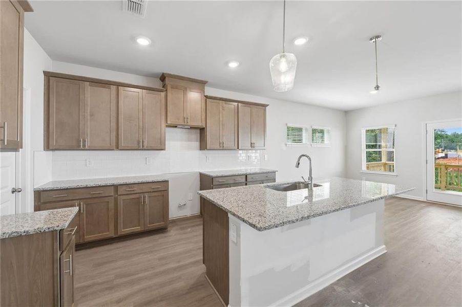 Furnished interior view inside a new home in Martin Springs - Estate Series, Lawrenceville (Image 7).