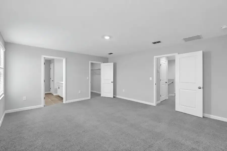 Representative unfurnished interior of a home built from the Dove by Taylor Morrison in Azure at Solaeris, Port St. Lucie (Image 27).