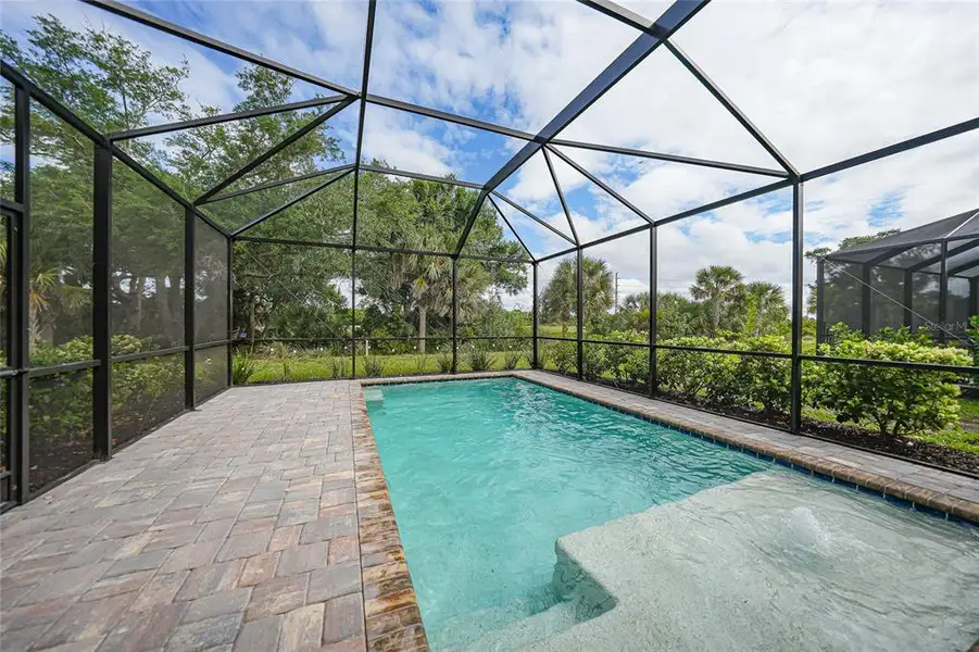 Exterior details and patio area of a home in , Englewood (Image 3).