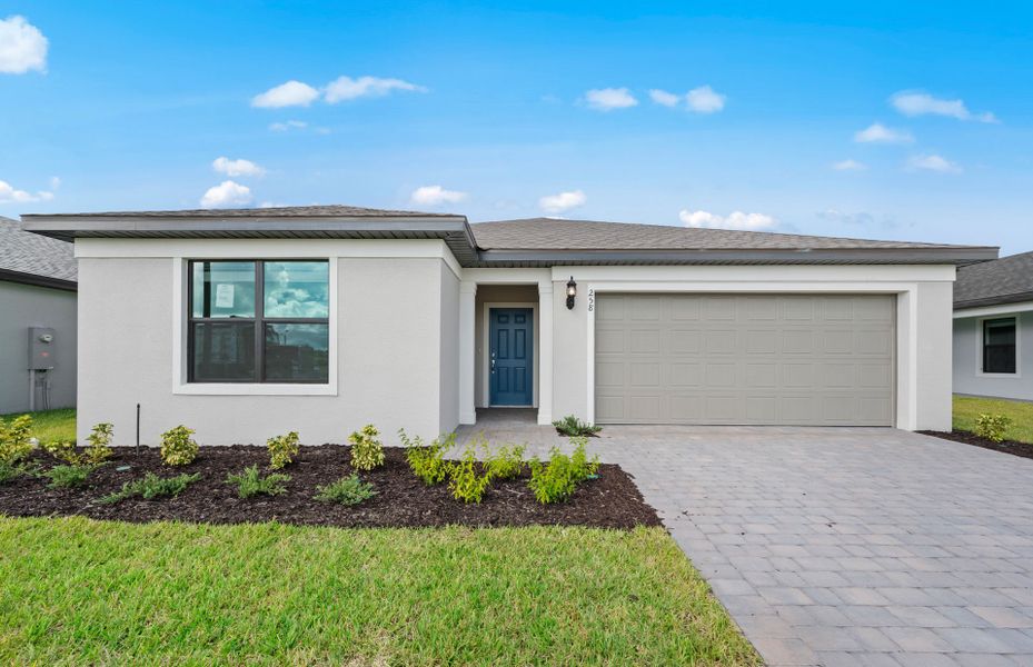 Exterior details and patio area of a home in Whispering Lakes, Lehigh Acres (Image 3).