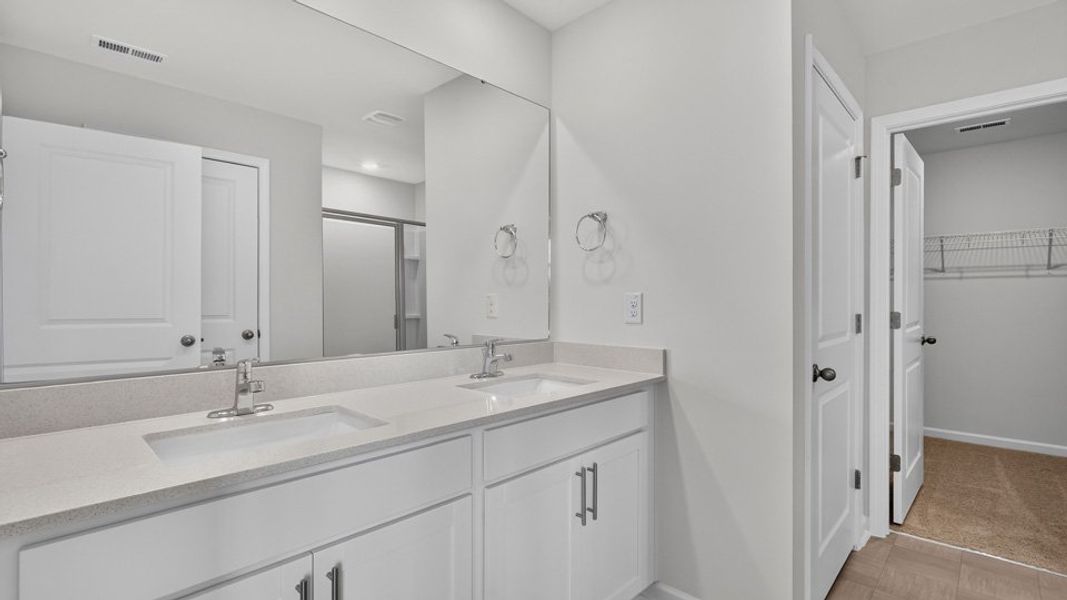 Furnished interior view inside a new home in The Reserve at Prestleigh, Wake Forest (Image 11).