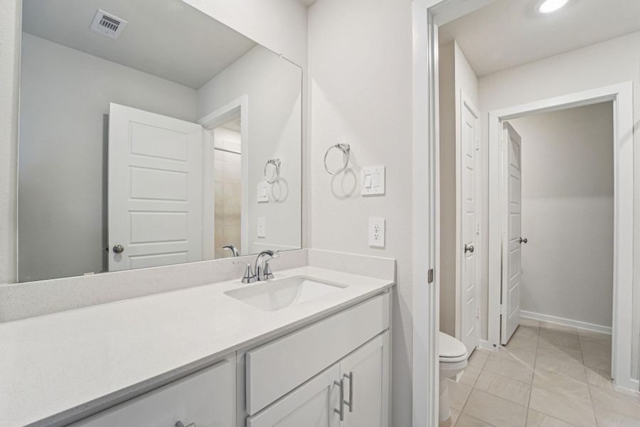 Furnished interior view inside a new home in Granger Pointe - Premier Series, Conroe (Image 13).