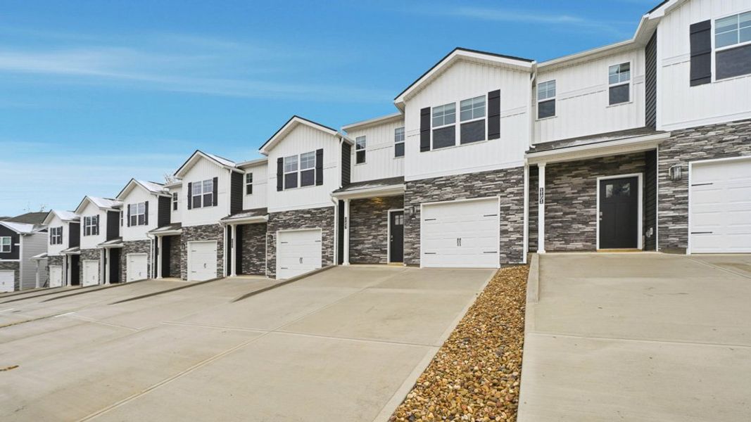 Front exterior of a new home in The Arbor Townhomes, Kingsport, TN, highlighting curb appeal (Image 2).
